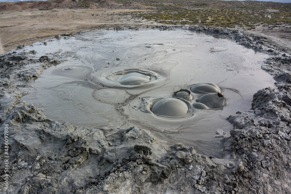 Mud volcanoes in Gobustan, Most volcanoes are low mud geysers. Azerbaijan. Baku. Mud volcanoes in Gobustan, Most volcanoes are low mud geysers. Azerbaijan. Baku.