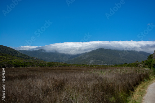 Mountain with blanket of clouds
