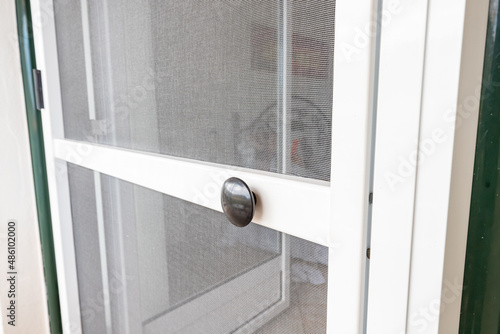 mosquito net on the door. Protection from blood-sucking insects in the summer