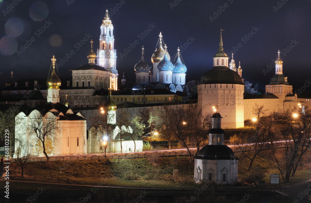 Rusian white ortodox church at night, Golden Domes of Church, White Church, Christian church, blue Domes in Sergiev Pasad, Russia
