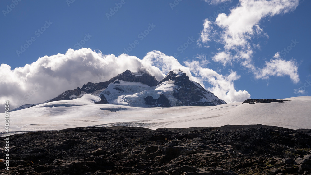Alpine landscape. View of Tronador hill rocky summit and glacier Castaño Overa snow and ice field. Alpine landscape. View of Tronador hill rocky summit and glacier Castaño Overa snow and ice field.