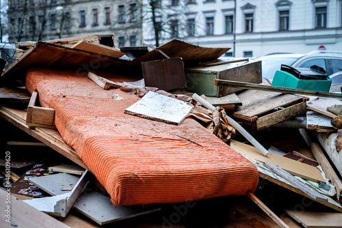Construction waste. Broken furniture and household waste during the reconstruction of the apartment. Illegal dumping. Selective focus