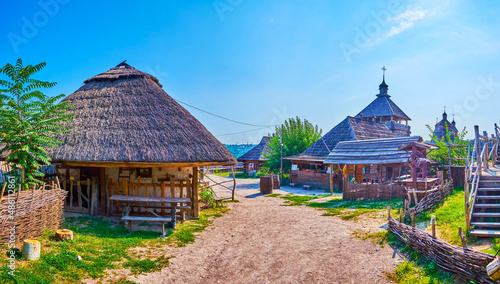 The Small Kish of Zaporozhian Sich scansen with hata houses and shynok restaurant, Khortytsia Island, Zaporizhzhia, Ukraine photo
