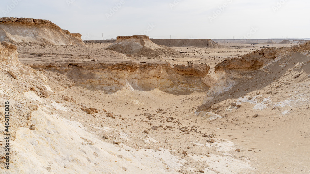 Zekreet desert natural landscape with with many limestone rocks.