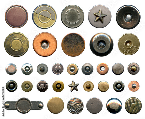 Set of different metal buttons and rivets. Vintage fushion accessories close-up isolated on a white background. Denim culcure modern style