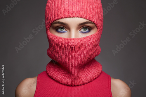 beautiful eyes of girl in red balaclava photo