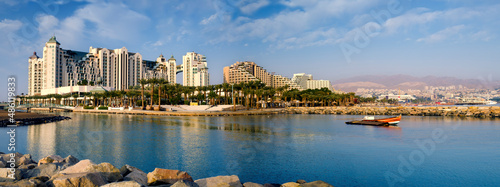View on northern beach of the Red Sea in Eilat - famous tourist resort and recreational city in Israel