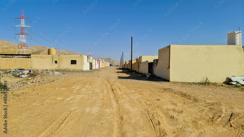 random house with no road near mountains. rough road random house with no road near mountains. rough road