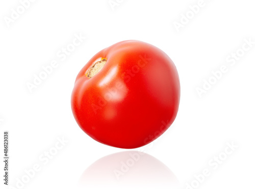 red fresh ripe tomato isolated on white background