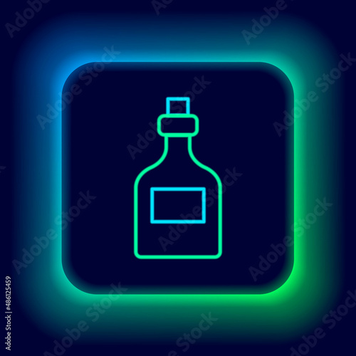 Glowing neon line Alcohol drink Rum bottle icon isolated on black background. Colorful outline concept. Vector