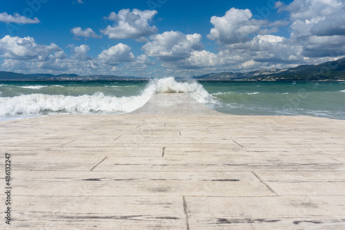 view of the raging sea and panoramic landscape from the sea pier