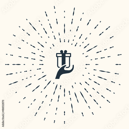 Grey Give gift icon isolated on beige background. Gift in hand. The concept of giving and receiving a gift. Abstract circle random dots. Vector