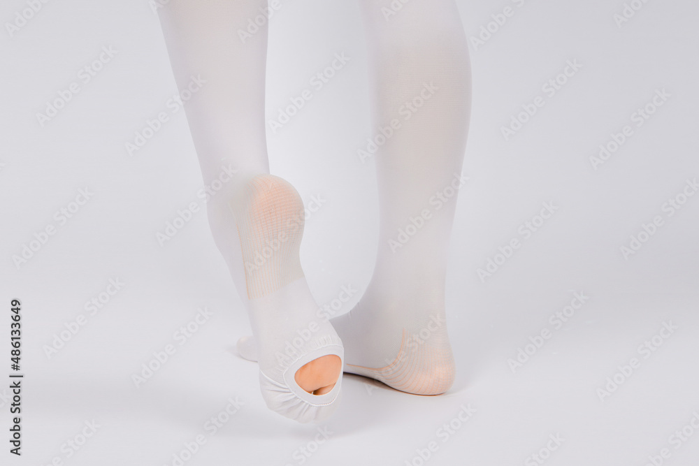 Anti-embolic Compression Hosiery for surgery isolated on white. Medical white stockings, tights for varicose veins and venouse therapy. Thrombo embolic deterrent hose or anti-embolism stockings Anti-embolic Compression Hosiery for surgery isolated on white. Medical white stockings, tights for varicose veins and venouse therapy. Thrombo embolic deterrent hose or anti-embolism stockings