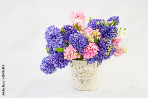 Fototapeta Naklejka Na Ścianę i Meble -  Pink and purple hyacinth bouquet in vase. Holiday background. Valentines Day, Mothers day concept.