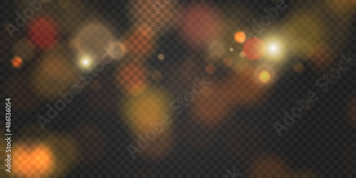 A light effect with a lot of shiny glare particles falling from top to bottom on a dark background.