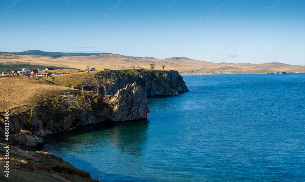 View of the village of Khuzhir from Shamanka Rock on lake Baikal at Olkhon island in September, Siberia, Russia.