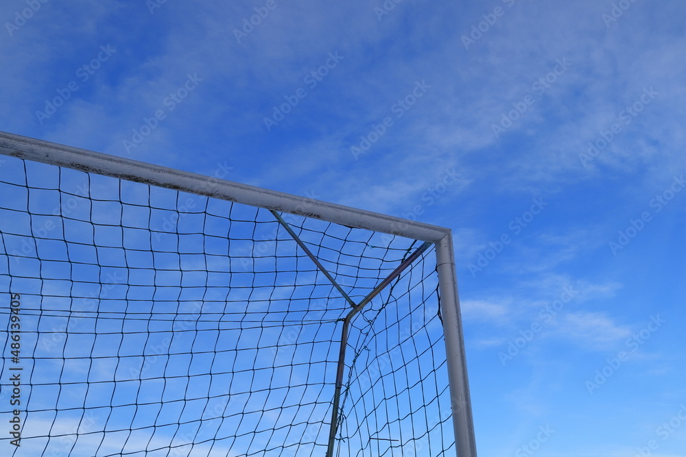 Football goal corner. Net against the blue sky. Copy space for extra text. Stockholm, Sweden, Europe. Football goal corner. Net against the blue sky. Copy space for extra text. Stockholm, Sweden, Europe.