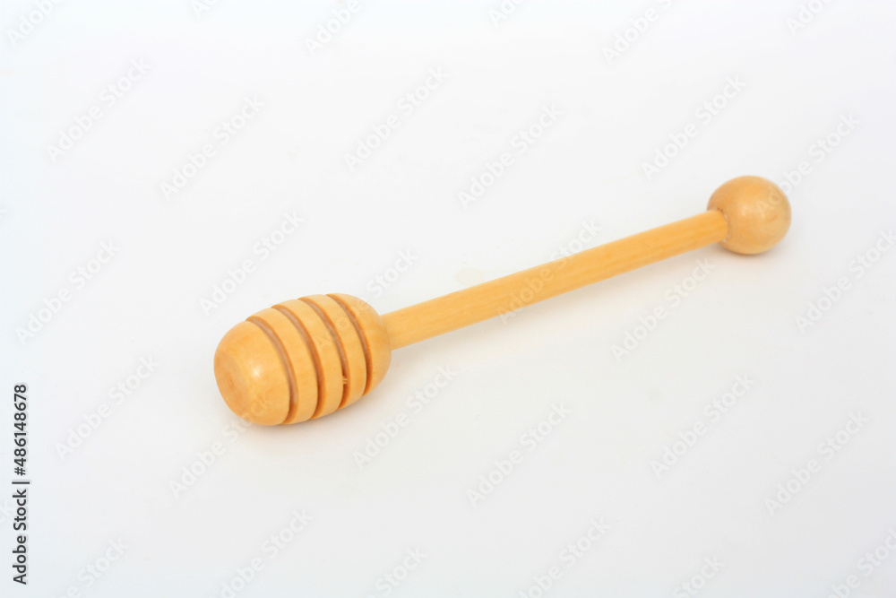 Honey scoop isolated on white background, save clipping path. Honey scoop isolated on white background, save clipping path.