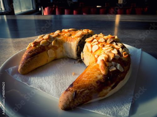 Delicious croissants standing on a white porcelain plate photo