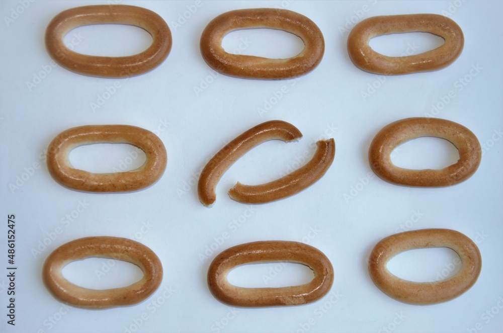 bagels on a white background. Pattern. Biscuits for drinks bagels on a white background. Pattern. Biscuits for drinks
