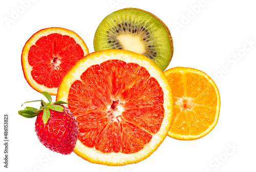 Bright circles of citrus fruits isolated on a white background.