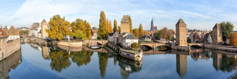La Petite France with bridge over river Ill water tower panorama Alsace in Strasbourg, France
