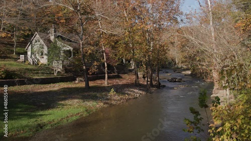 beautiful creek flowing by a house in the fall in Kentucky