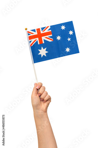 Female hand holding Australian flag, isolated on white background © SDF_QWE