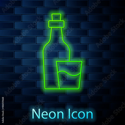 Glowing neon line Soju bottle icon isolated on brick wall background. Korean rice vodka. Vector