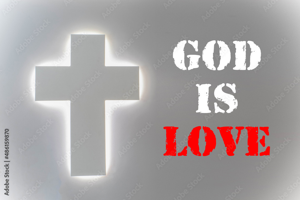 Fototapeta premium God is love - christian lettering, biblical phrase on blue and yellow with lights background.