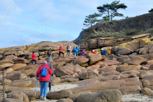 Group of senior hikers at Trebeurden in Brittany-France photo