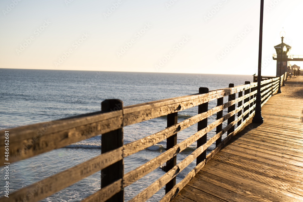 Walking the pier during sunset Walking the pier during sunset