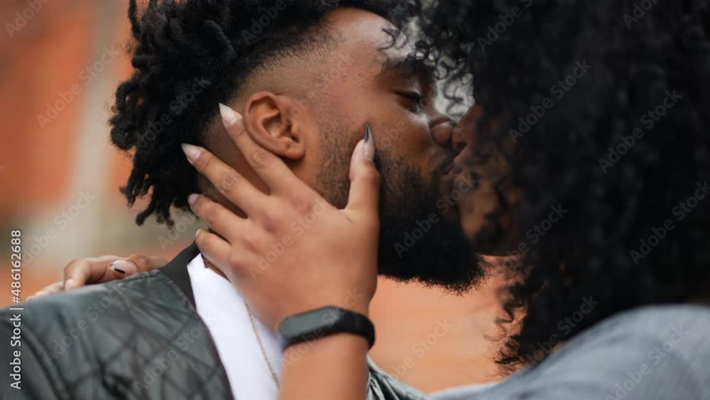 A latin black couple kissing each other boyfriend and girlfriend kiss