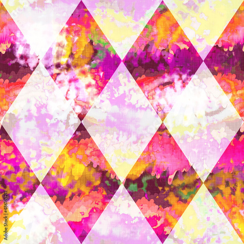 Diamond checkerboard summer tie dye batik beach wear pattern. Seamless stain harlequin check space dyed effect fashion. Washed out quilt patchwork soft furnishing background. 