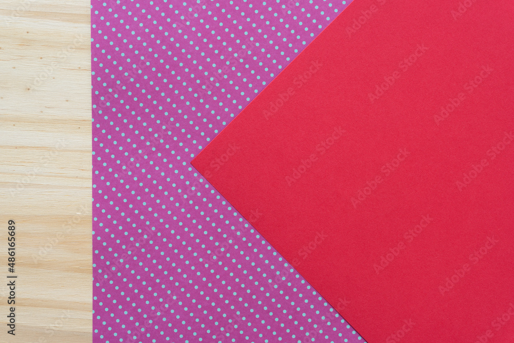 background with red paper, polka dots, and wood background with red paper, polka dots, and wood