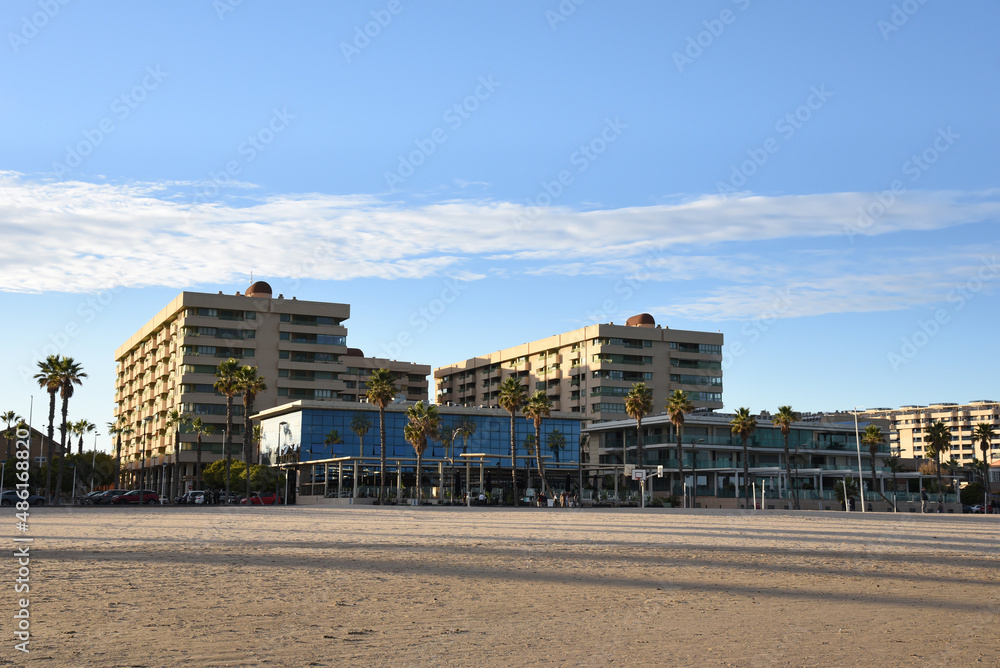 Fototapeta premium Luxury apartments at La Patacona Beach. Hotel in Alboraya. Living Valencia Patacona Beach. Travel on touristic famous and popular Beaches of Valencia with unique landscape. Beach at sea near apartment