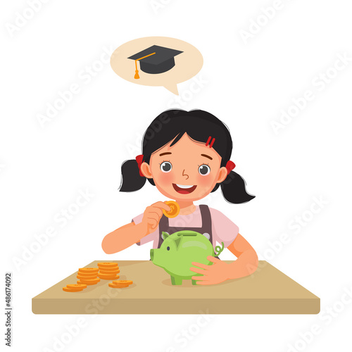 Little girl putting coins into a piggy bank saving money on her higher education or for collage