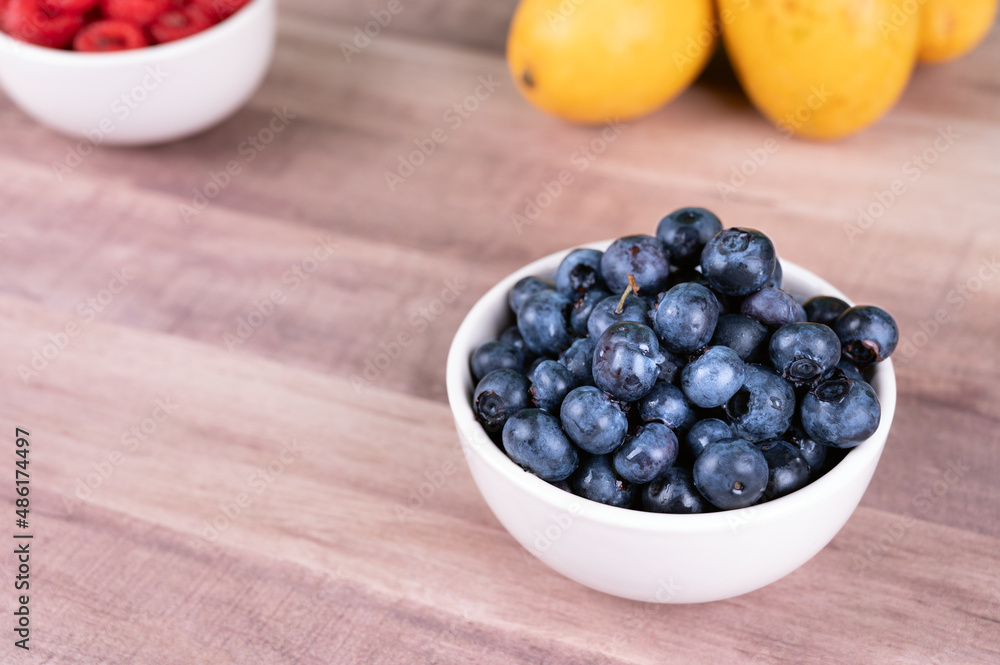 Fresh blueberries in glass bowl Fresh blueberries in glass bowl