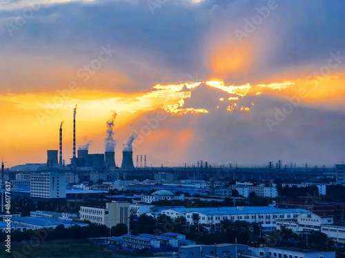 refinery at sunset