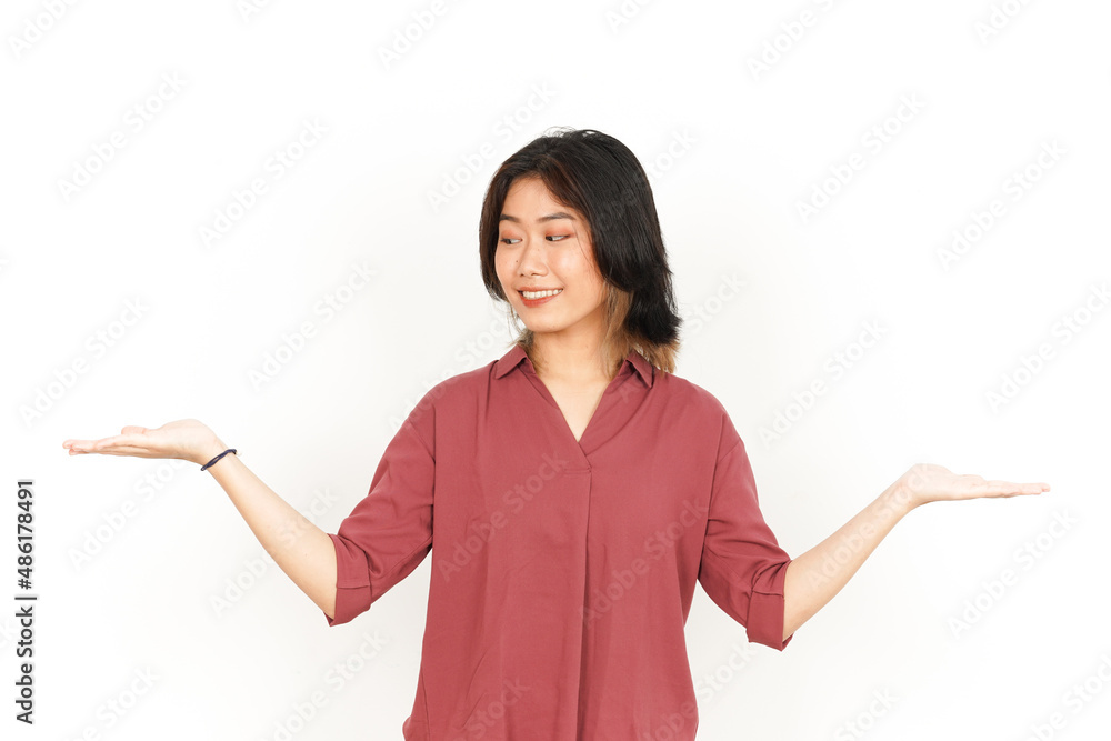 Showing and Presenting Two Product on Open Palm Of Beautiful Asian Woman Isolated On White Background Showing and Presenting Two Product on Open Palm Of Beautiful Asian Woman Isolated On White Background