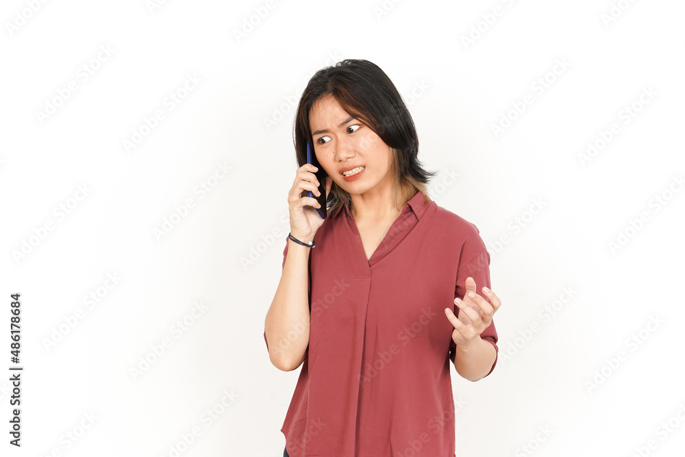 Make a Phone Call Using smartphone with angry face Of Beautiful Asian Woman Isolated On White Background Make a Phone Call Using smartphone with angry face Of Beautiful Asian Woman Isolated On White Background