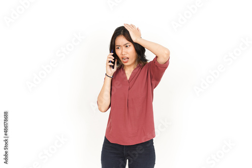 Make a Phone Call Using smartphone with angry face Of Beautiful Asian Woman Isolated On White Background