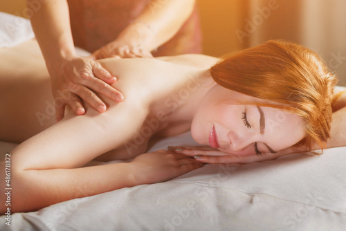a woman on a massage in the spa. Beauty and health center