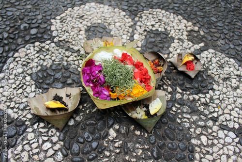 Balinese daily offerings called canang sari at Hindu Temple photo