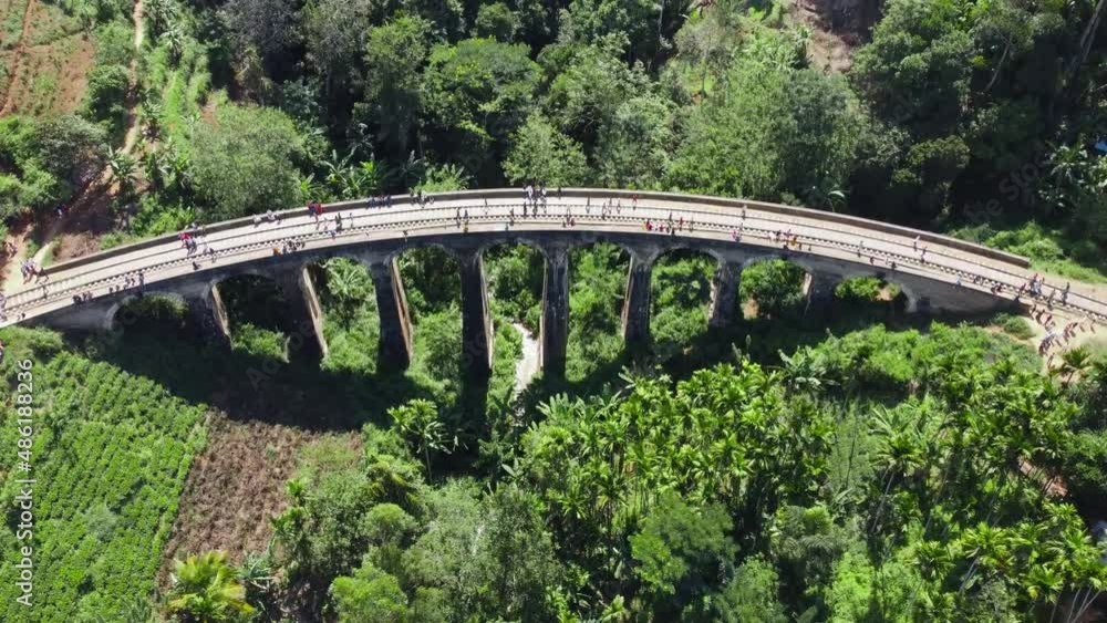 Overtake Shot Of People Walking On Famous Nine Arches Bridge, Demodara, Sri Lanka Overtake Shot Of People Walking On Famous Nine Arches Bridge, Demodara, Sri Lanka