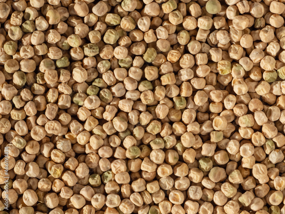 Background of pea seeds. Dry yellow peas close-up as a natural background Background of pea seeds. Dry yellow peas close-up as a natural background