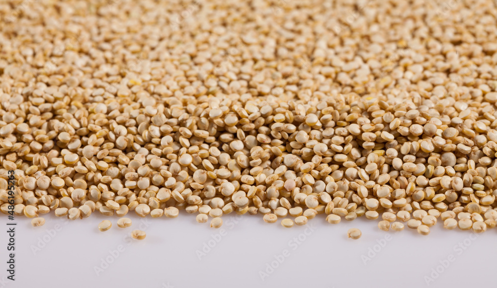 Fototapeta premium Organic white quinoa seeds background