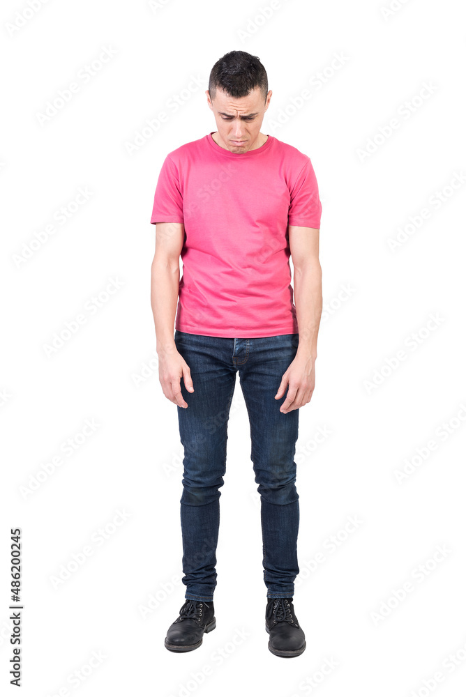 Displeased man in light studio. White background Displeased man in light studio. White background