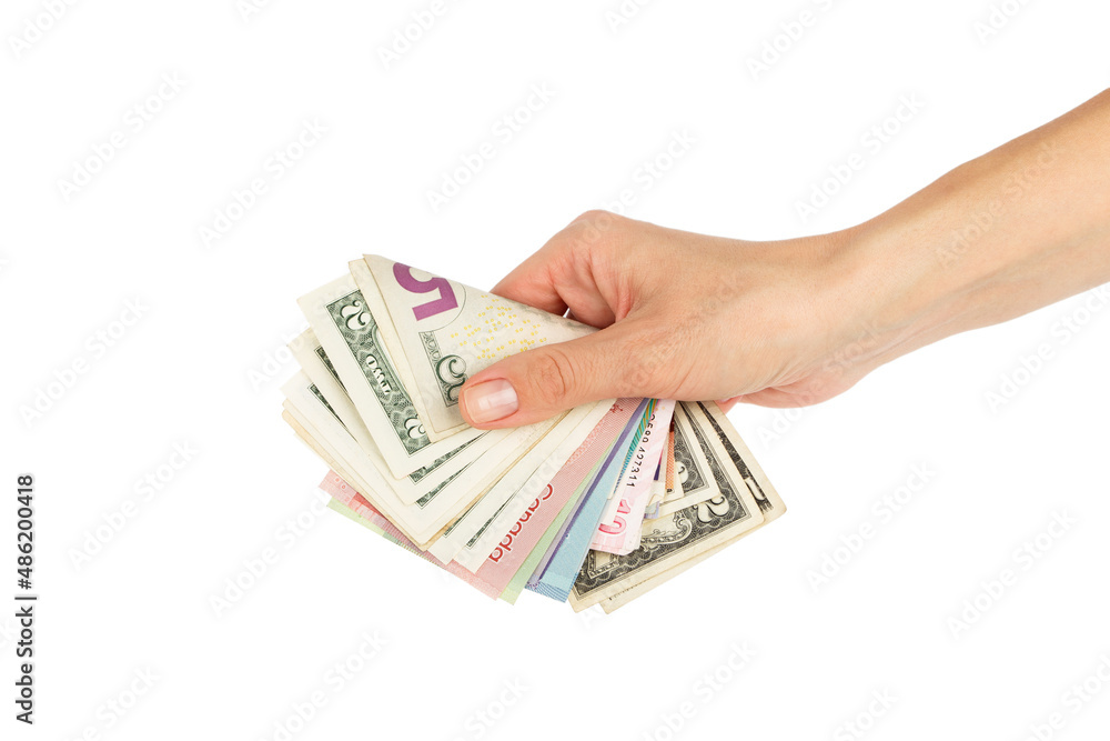 Different money from all over the world in the hand Different money from all over the world in the hand