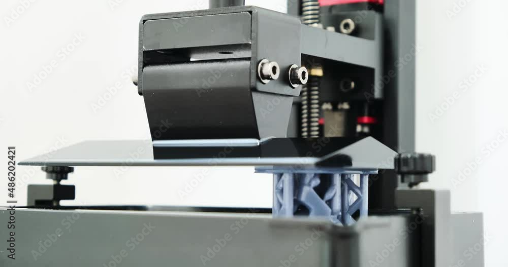 Time lapse of SLA 3D printer printing part form liquid resin using MSLA or Masked Stereolithography. Side angle view Time lapse of resin MSLA 3d printer, additive manufacturing. Time lapse of SLA 3D printer printing part form liquid resin using MSLA or Masked Stereolithography. Side angle view Time lapse of resin MSLA 3d printer, additive manufacturing.